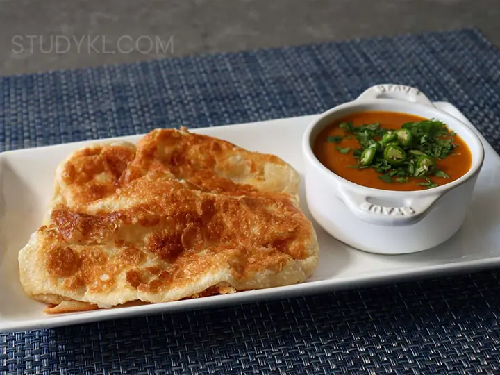 Roti Canai – روتی چَنای (صبحانه محبوب مالزی)